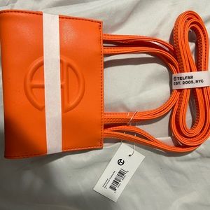 BRAND NEW SMALL ORANGE TELFAR.